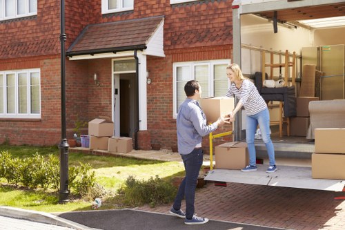 Furniture being carried carefully during a home relocation