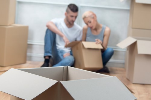 Removal team planning a move in a Cubitttown street