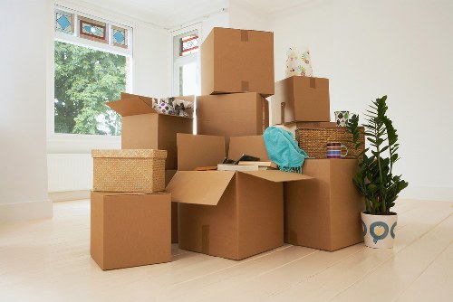Local office removals vehicle loading commercial furniture in Cubitttown