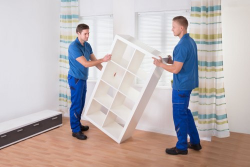 Careful loading of household items for transport in Cubitttown