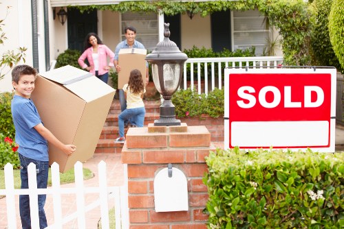 Local moving team handling household items carefully