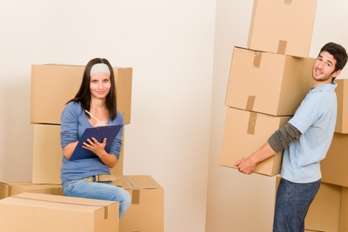 Local removal team handling household items in a Cubitttown home